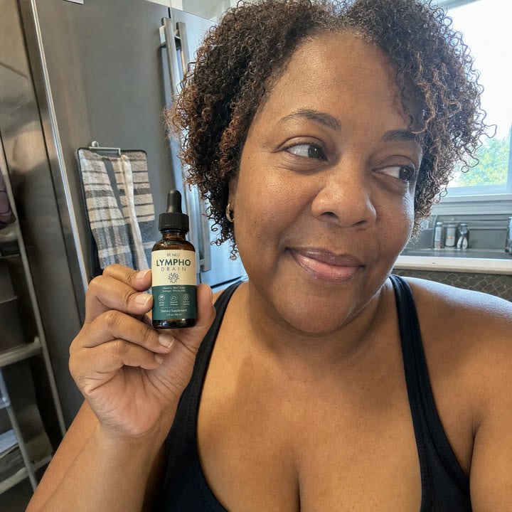 Yvonne P., 57 holding Be Neo LymphoDrain